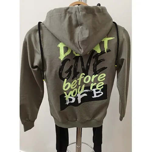 Children's clothing set, consisting of a jersey made of knitted khaki textile material with a hood and drawstrings, a zip fastening, and trousers.