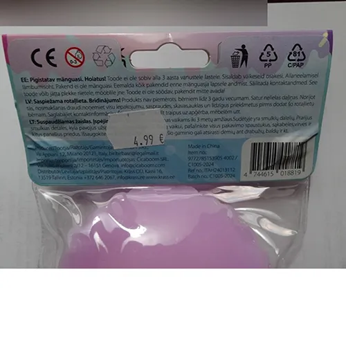 Anti-stress toy, 10cm long, made of purple-pink soft plastic confectionery (tartlet with berries) with multi-coloured plastic sprinkles, coloured/pearl balls of various sizes, with plastic candies (2 cm) and a flower (1.5 cm).