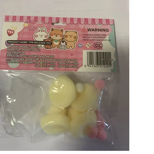 Squeezable stress relief set, consisting of: 4 ducklings, made of elastic and soft material for kneading in the hands, which returns to its original shape when squeezed, and balls of various colours.