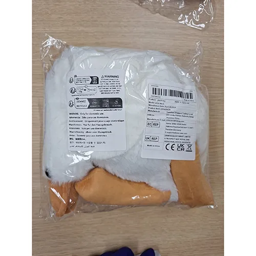 Plush toy, in the shape of a white duck with black plastic eyes. Product sold online, in particular via Temu.