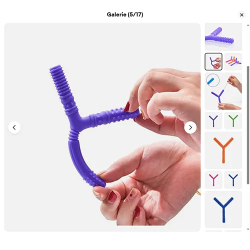 Teething toy of soft purple plastic in the shape of the letter Y, with various textures. Product sold online, in particular via eBay (unique identifier: 197497295169).