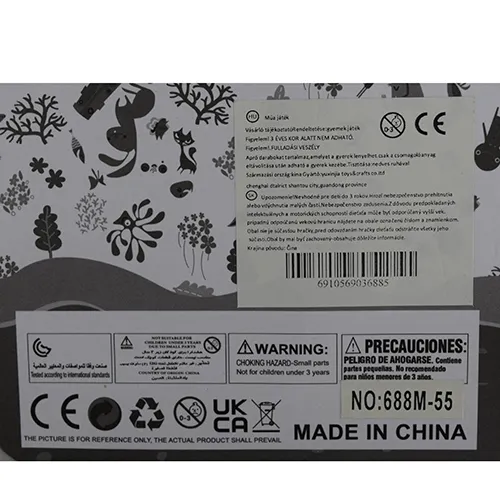 Toy rattle, intended for babies, in the shape of a colourful soft bunny with rattling accessories attached to its limbs.