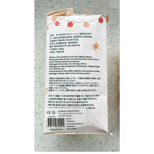 Soft toy in the shape of a Labubu-like monster with a metal ring. Part of the 