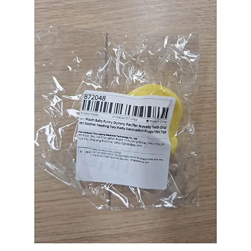 Yellow soother in the shape of a duck's beak. Product sold online, in particular via AliExpress (unique identifier: 1005007316464587).