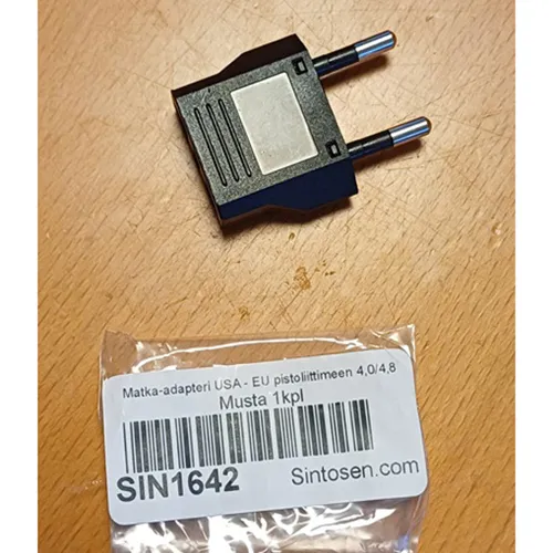 Travel adaptor in black or white with class II EURO plug and socket outlet for US class II Type A and schuko plug.