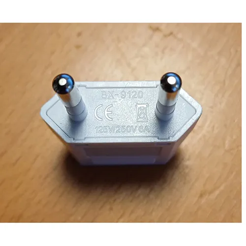 Travel adaptor in black or white with class II EURO plug and socket outlet for US class II Type A and schuko plug.