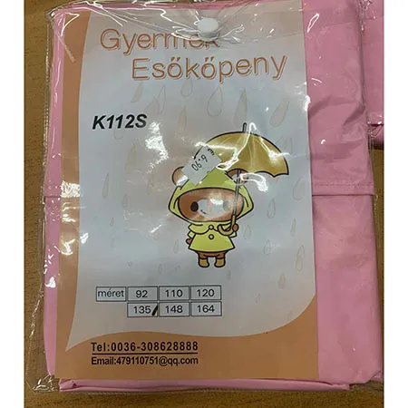 Rain coat made of pink synthetic waterproof material, designed for wearing in rainy weather, with a hood and fastens with press studs in the front. The information indicated on the labelling label sewn into the side seam: