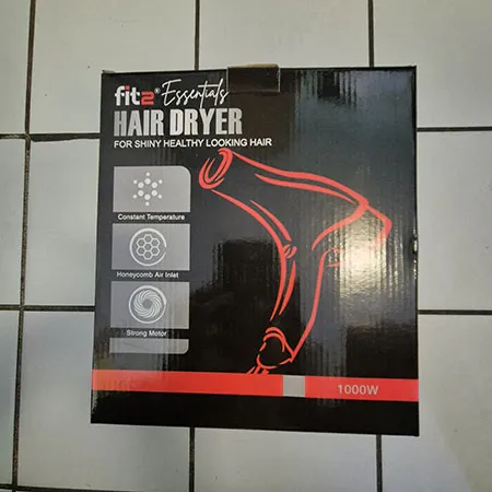 Black hair dryer with blue buttons.