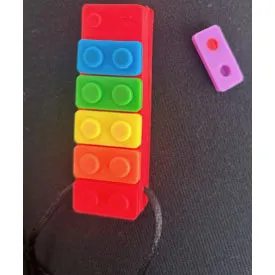 Teething toy made of colourful soft plastic, intended for babies. Product sold online, in particular via Allegro.pl.