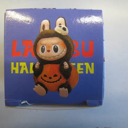 Soft toy, made of plastic and felt, in the shape of a Labubu-like doll. The toy includes a strap. Production date: June 2025.