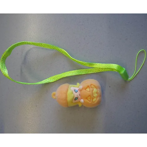 Soft toy, made of plastic and felt, in the shape of a Labubu-like doll. The toy includes a strap. Production date: June 2025.