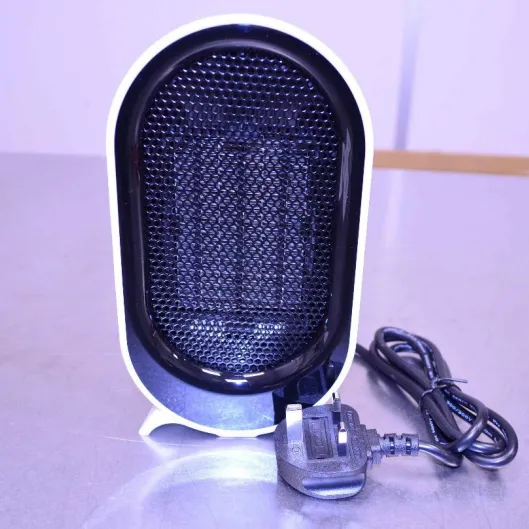 Portable fan heater with attached wall plug. Product sold online, in particular via Amazon (ASIN: B0FGXLJXJY).