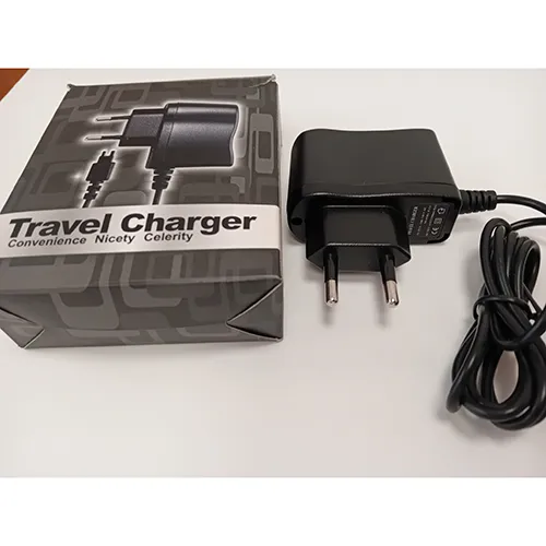 Travel charger , 100-240 V mains supply.