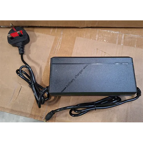 Battery charger with attached wall plug.