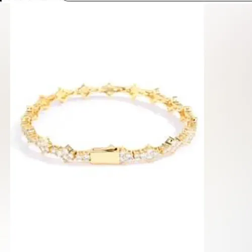 Golden metal bracelet with rhinestones. Product sold online, in particular via AliExpress (unique identifier: 1005007161804011).