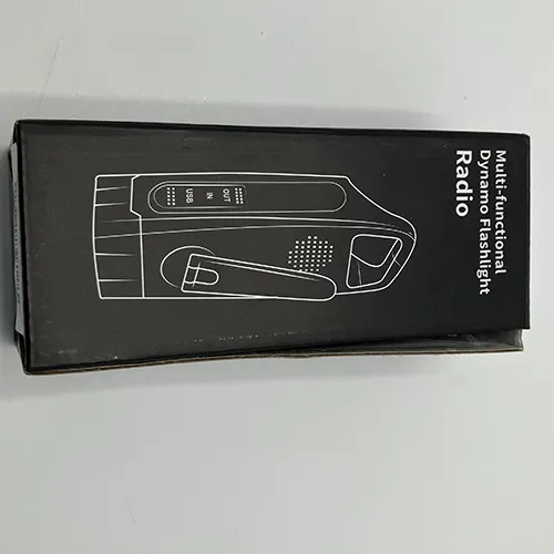 Emergency radio made of hard plastic shell, fitted with a textile wrist strap. Product sold online, in particular via www.tacticalstore.se.