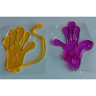 Plastic sticky toy in the form of a hand with a cord. Product sold online, in particular via Wish.