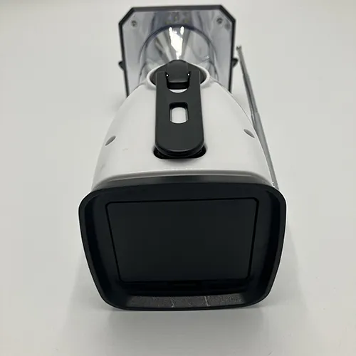 Grey 8 LED camping lantern with FM radio, approximately 25 cm in height. Powered by way of crank, solar panel or AA batteries. Product sold online, in particular via teknikproffset.se.