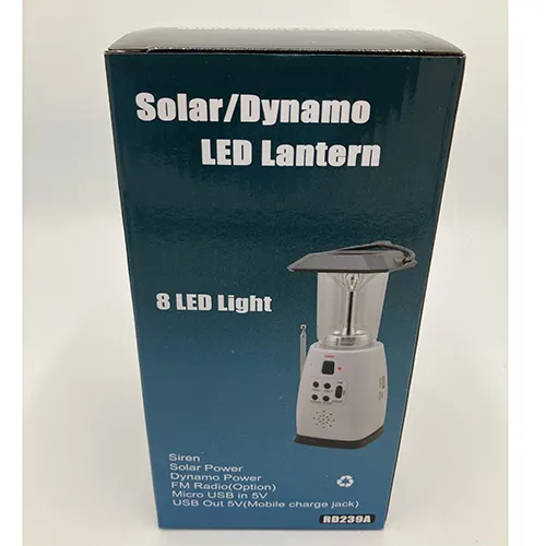 Grey 8 LED camping lantern with FM radio, approximately 25 cm in height. Powered by way of crank, solar panel or AA batteries. Product sold online, in particular via teknikproffset.se.