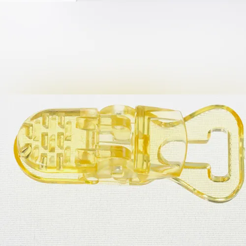 Yellow translucent soother holder. All batches are concerned. Product sold online, in particular via eBay (unique identifier:125098444284) and www.merceriecenter.com.