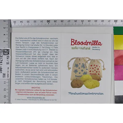 Six natural brown sponges of various shapes, intended for menstrual use. Product sold online, in particular via www.bloodmilla.de.