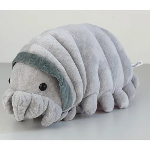 Grey plush figure in the shape of an animal with pink plush covering on the belly.