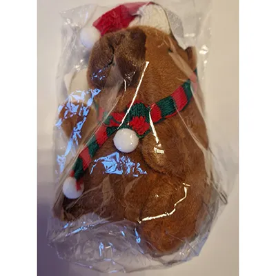 Soft toy in the shape of a capybara with a scarf, a Christmas hat and a keyring. Product sold online, in particular via SHEIN (Unique identifier: sl25090928921762626).