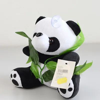 Soft toy in the shape of a panda with a suction cup.