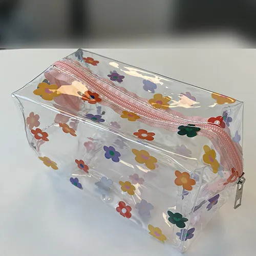 Plastic pencil case with a flower pattern. Product sold online, in particular via AliExpress.