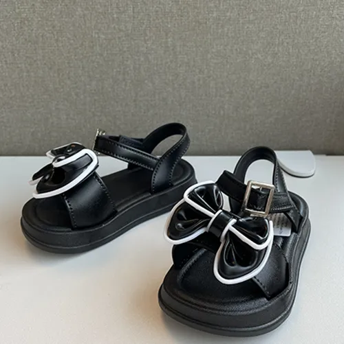 Children's sandals with a bow. Product sold online, in particular via Temu.
