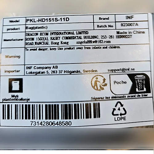 Transparent PVC handbag with a black strap. Product sold online, in particular via www.elkjop.no.