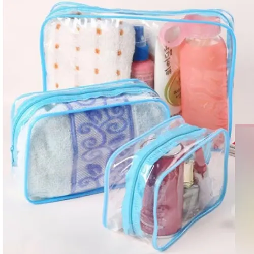 Set of 3 PVC toiletry bags with blue edges with clear sides. Product sold online, in particular via www.elkjop.no.