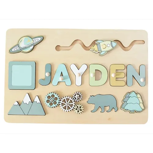 Wooden activity toy with range of activities: puzzle (shapes and letters), wheels for turning and hot-air balloon for sliding. Product sold online, in particular via www.es-jeux-montessori.com.