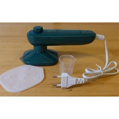 Portable hanging mini ironing machine. Product sold online, in particular via Aliexpress (unique product identifier: 1005009043222389).
