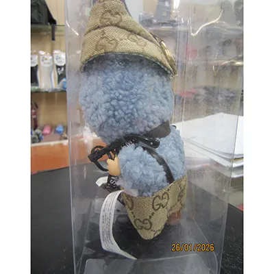 Soft toy with a key ring in the shape of a Labubu-like monster.