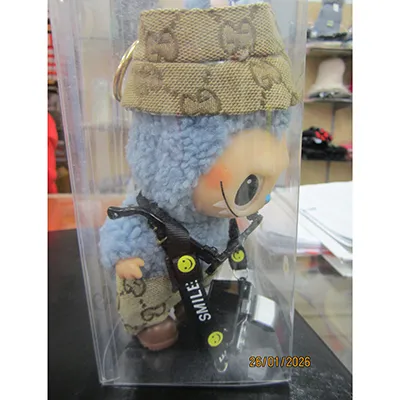 Soft toy with a key ring in the shape of a Labubu-like monster.