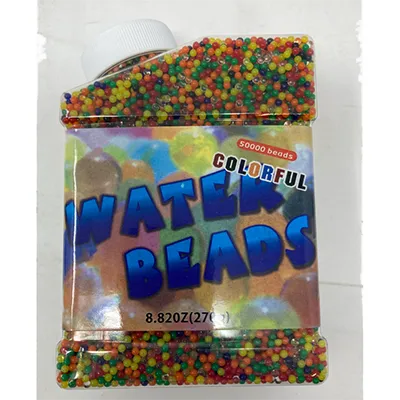 Multicoloured water beads, which grow when immersed in water. Product sold online, in particular via onbuy.com (unique product identifier: p54594684).