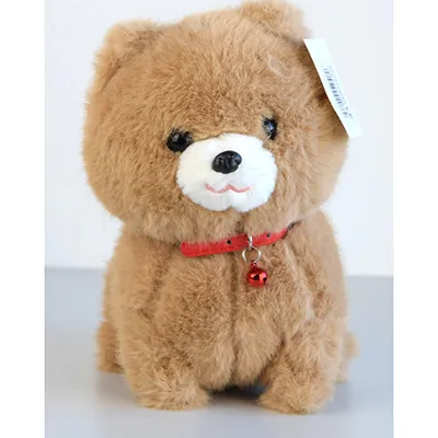 Brown soft toy in the shape of a dog with a rattle around the neck.