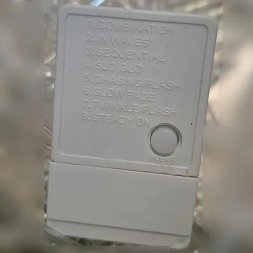 Lighting chain intended for interconnection, containing non-replaceable LED light sources, with a device for changing lighting modes.