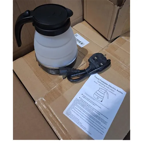Small, folding kettle with attached wall plug.