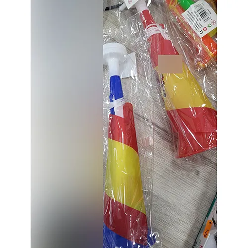 Plastic toy in the shape of a blue horn with a white mouthpiece.
