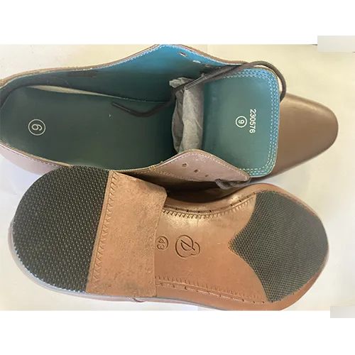 Brown leather shoes, intended for men.
