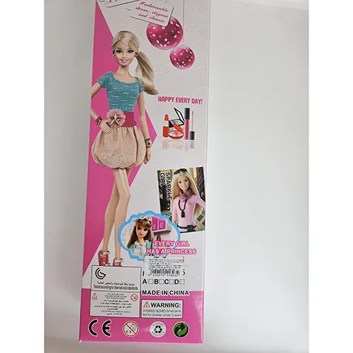 Toy plastic doll with colourful clothes.