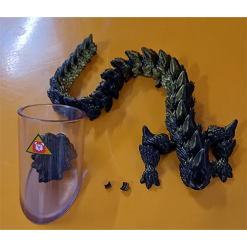 3D-printed, multicoloured dragon toy, advertised as a desk ornament or fidget toy. Product sold online, in particular via eBay.