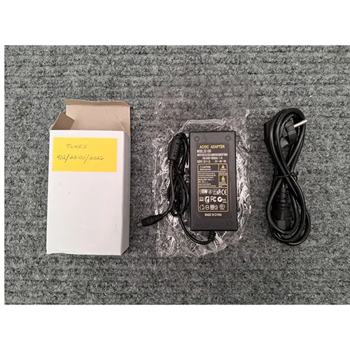 Class II AC/DC power supply unit with detachable power supply cord and accessible DC output.