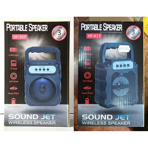 Wireless speaker with black plastic casing and built-in battery.