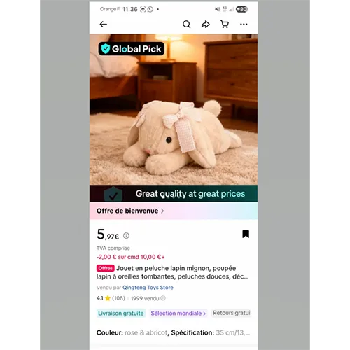 Soft toy in the shape of a brown rabbit with a pink nose, black plastic eyes and ribbons on the ears.