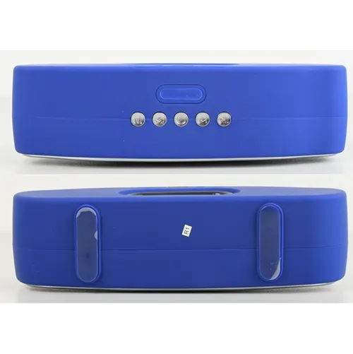 Wireless speaker with plastic casing and integrated rechargeable battery.