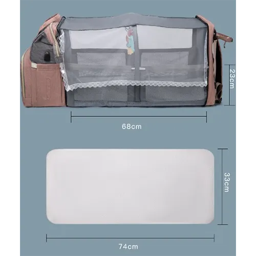 Backpack containing fold out crib with multiple compartments.