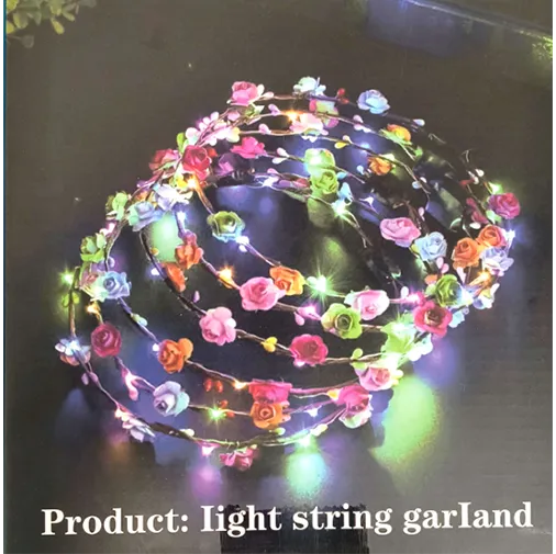Light string garland with multicoloured flowers and battery operated lights.